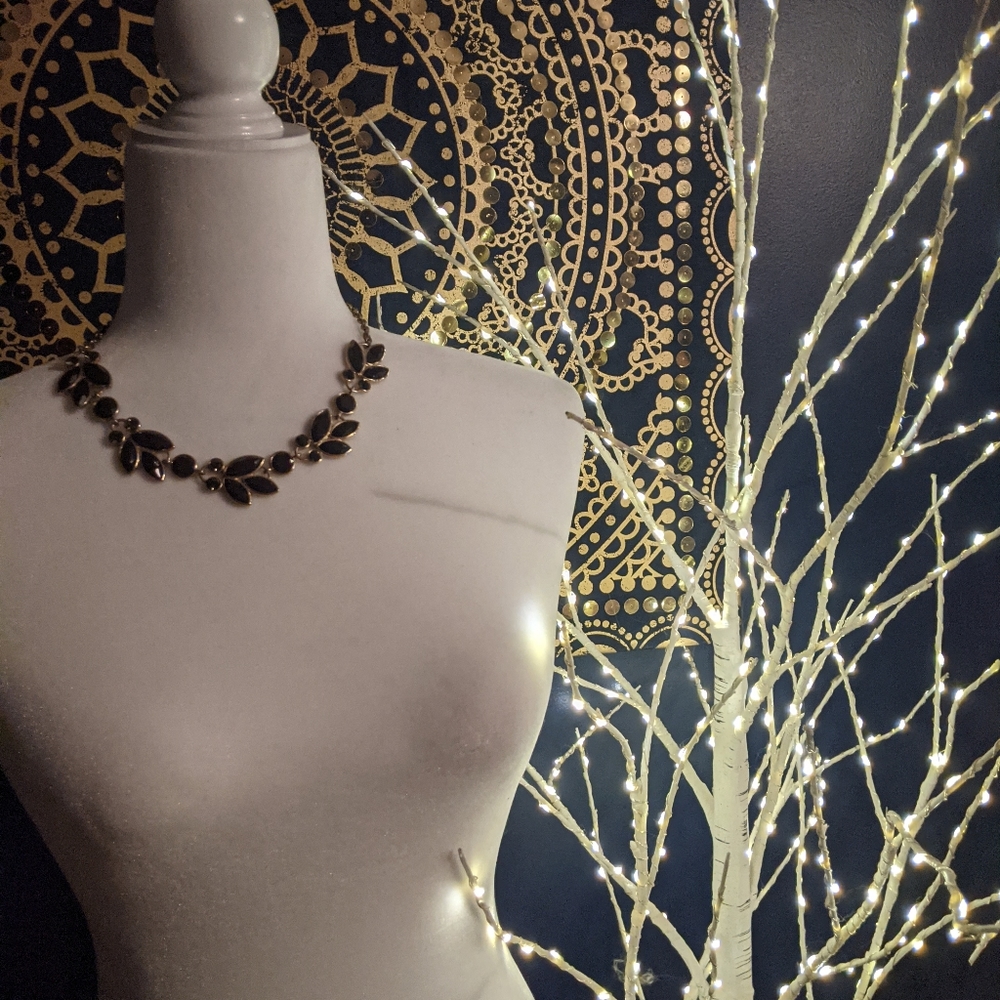 Francesca's navy and gold flower necklace